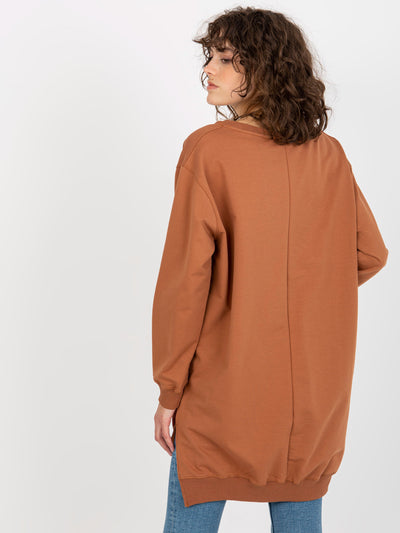 Jasnobrązowo-pomarańczowa długa bluza oversize z napisem
