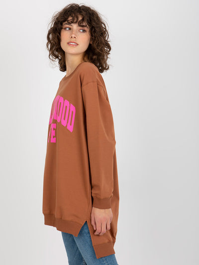 Jasnobrązowo-różowa długa bluza oversize z napisem