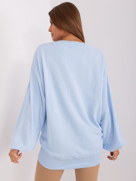 Jasnoniebieska damska bluza oversize