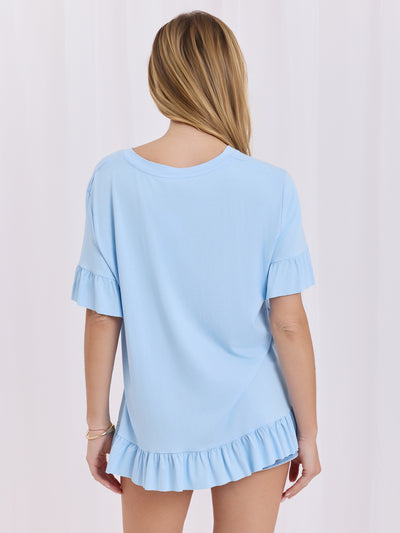 Jasnoniebieska bluzka oversize z falbankami
