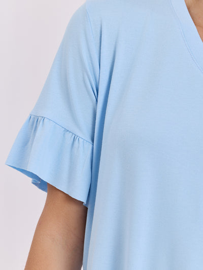 Jasnoniebieska bluzka oversize z falbankami
