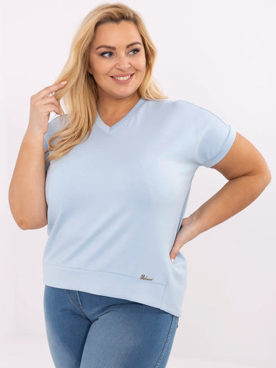 Jasnoniebieska bluzka plus size w jednolitym kolorze