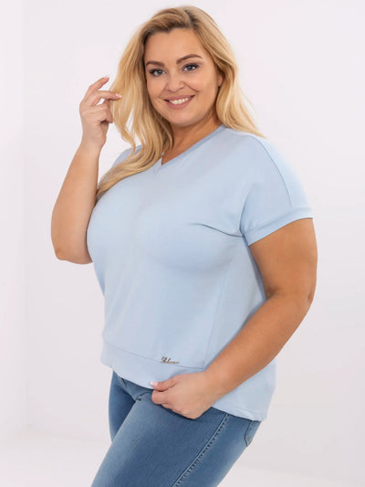 Jasnoniebieska bluzka plus size w jednolitym kolorze