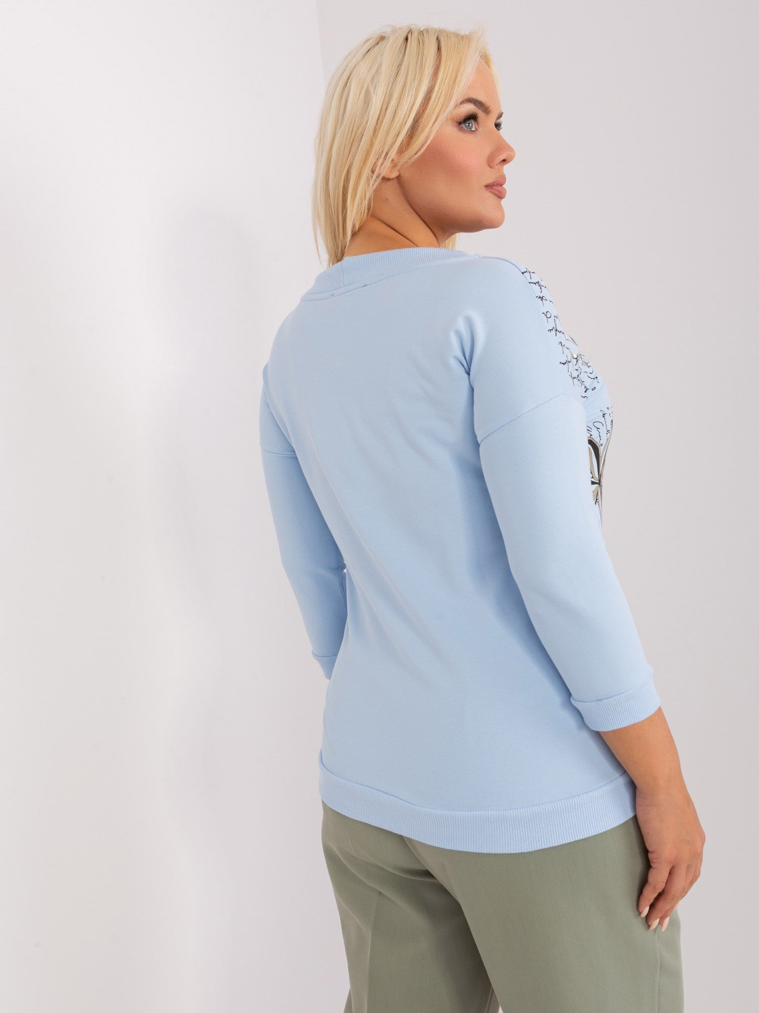 Jasnoniebieska damska bluzka plus size z printem