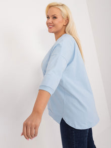 Jasnoniebieska bluzka plus size z rozcięciami