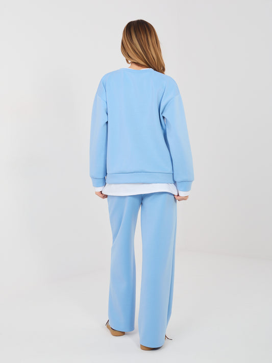 RUE PARIS Jasnoniebieskie dresowe spodnie straight leg