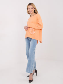 Jasnopomarańczowa bluza oversize bez kaptura