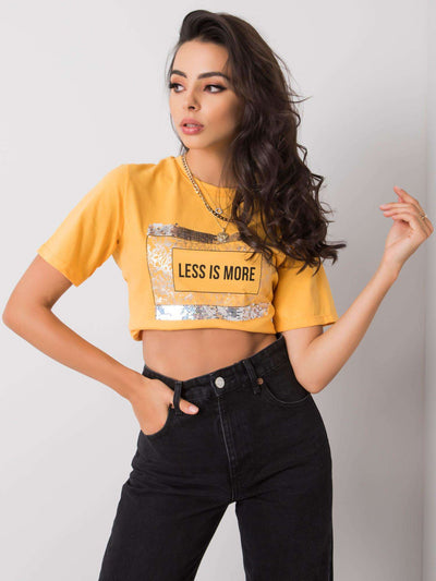 Jasnopomarańczowy t-shirt damski z napisem