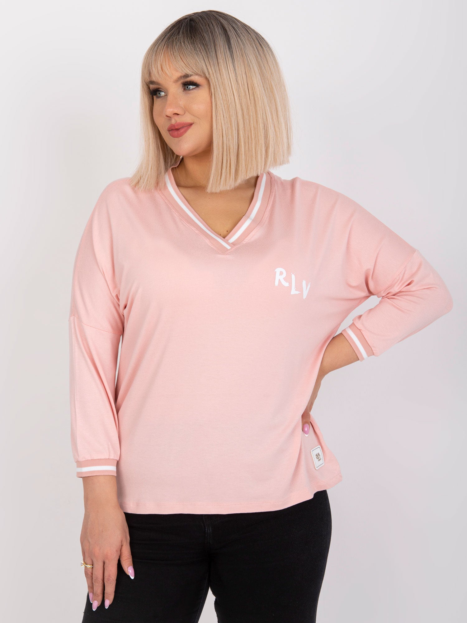 Jasnoróżowa bluzka plus size z bawełny
