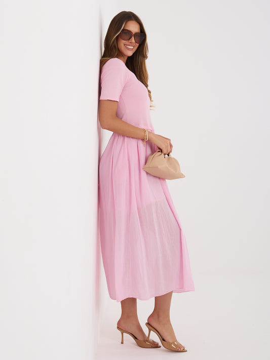 Jasnoróżowa rozkloszowana sukienka z podszewką