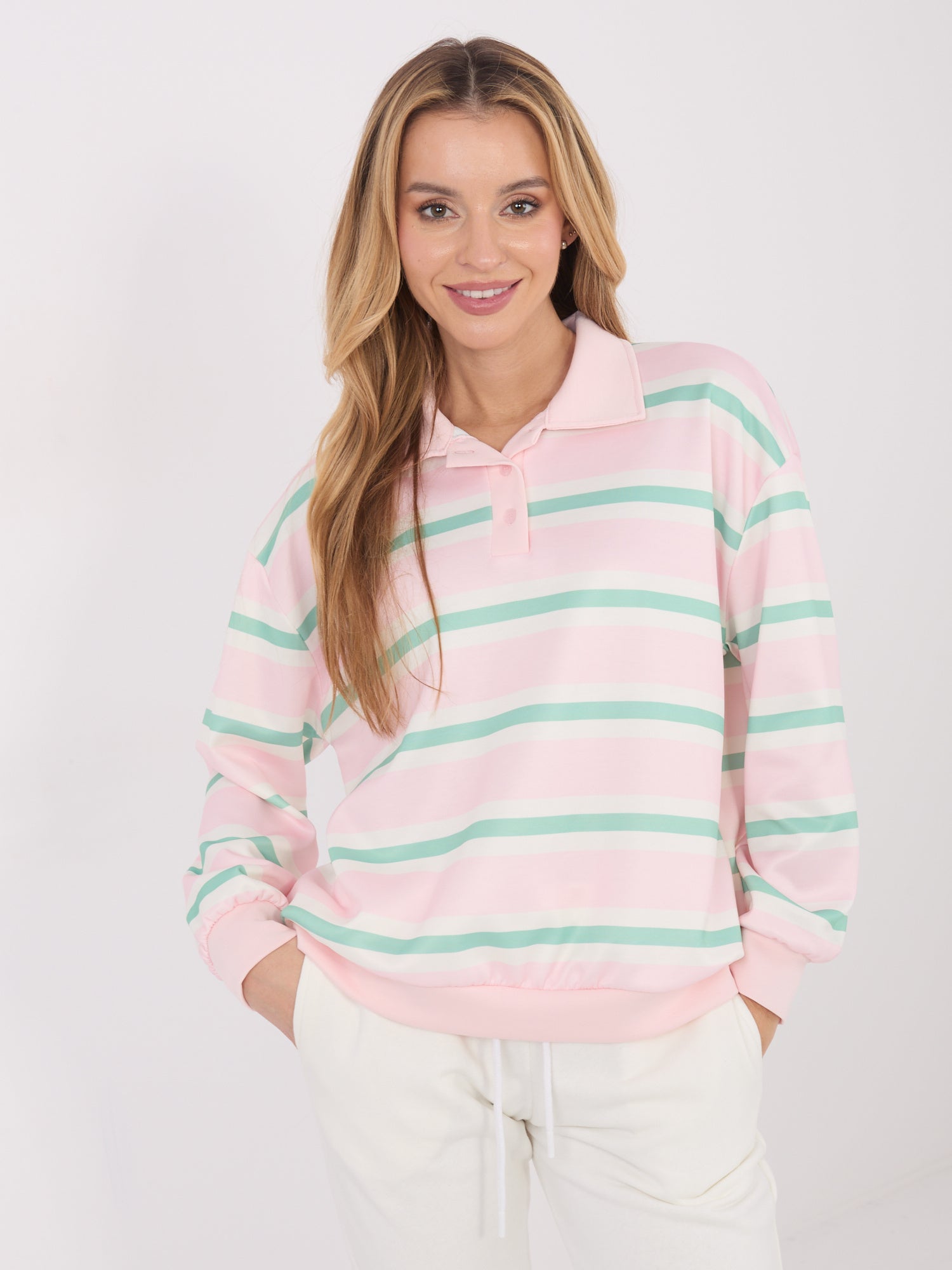 Jasnoróżowa damska bluza typu polo