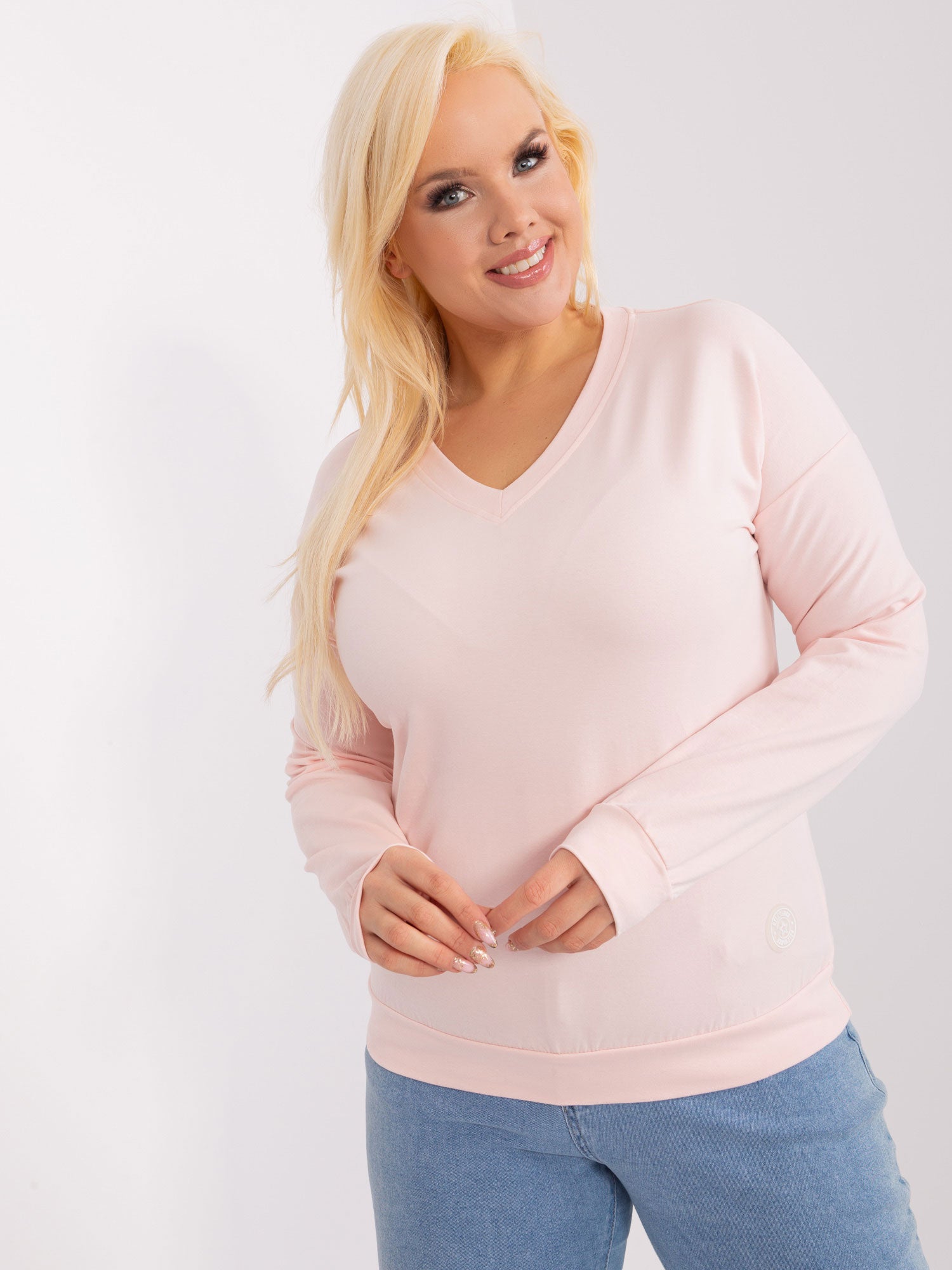 Jasnoróżowa damska bluzka plus size z bawełny
