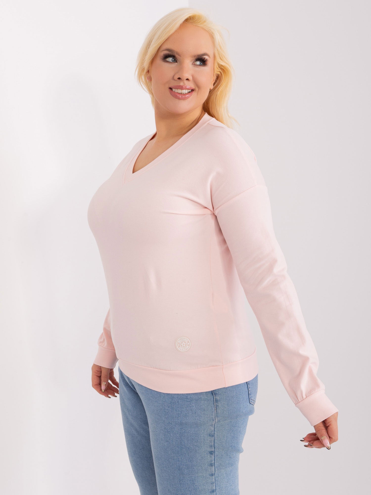 Jasnoróżowa damska bluzka plus size z bawełny