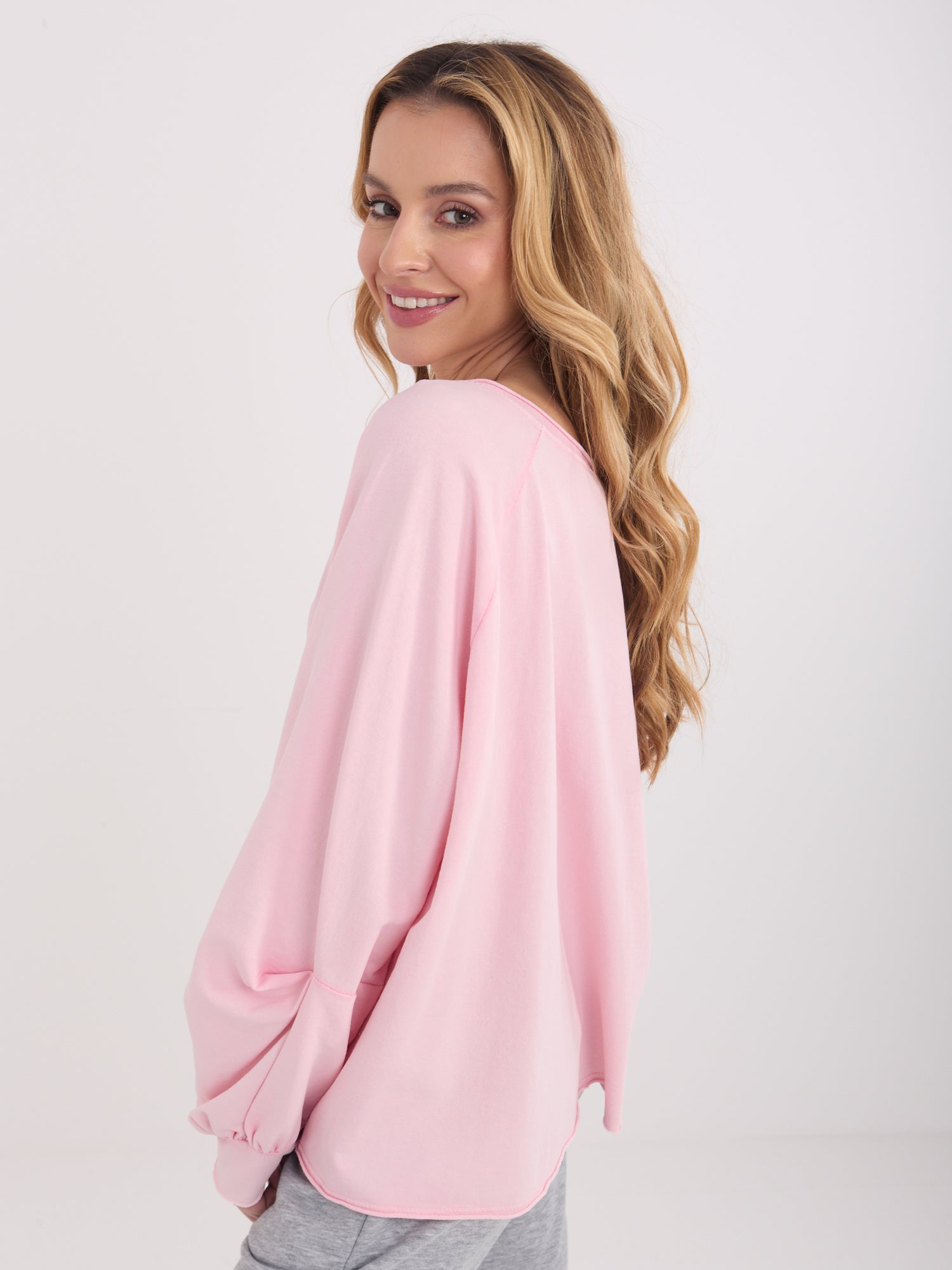 Jasnoróżowa bawełniana bluzka oversize