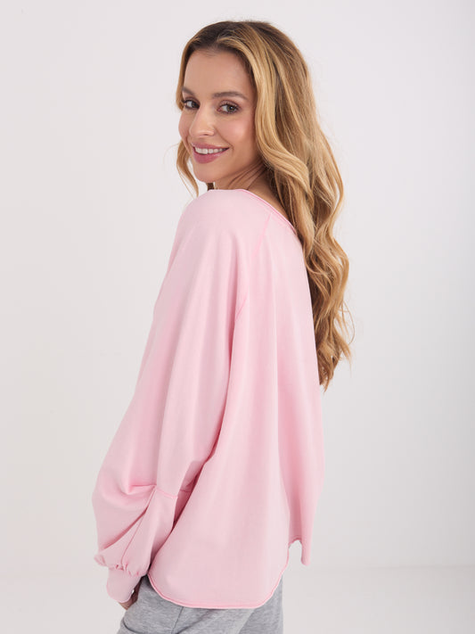 Jasnoróżowa bawełniana bluzka oversize