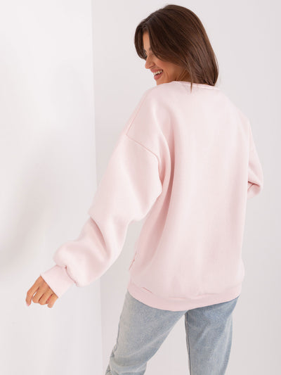 Jasnoróżowa bluza bez kaptura o kroju oversize
