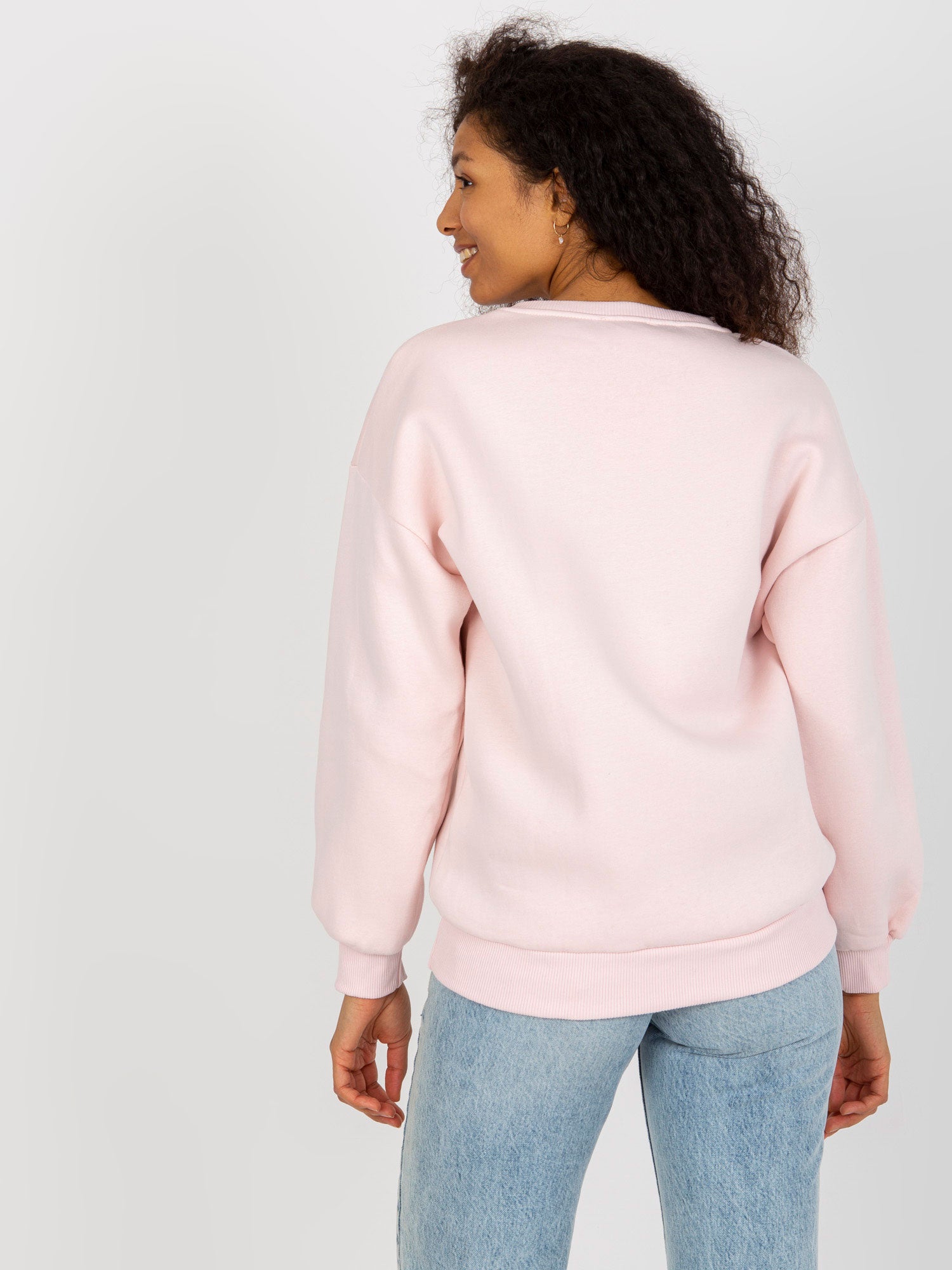 Jasnoróżowa dresowa bluza oversize z nadrukiem