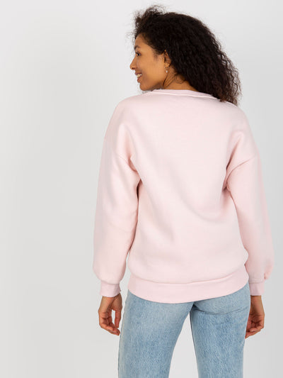 Jasnoróżowa dresowa bluza oversize z nadrukiem