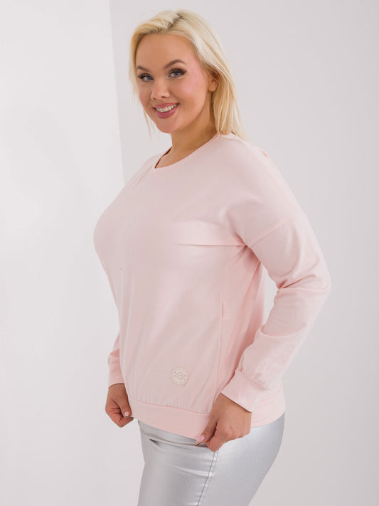 Jasnoróżowa bluzka plus size z długim rękawem