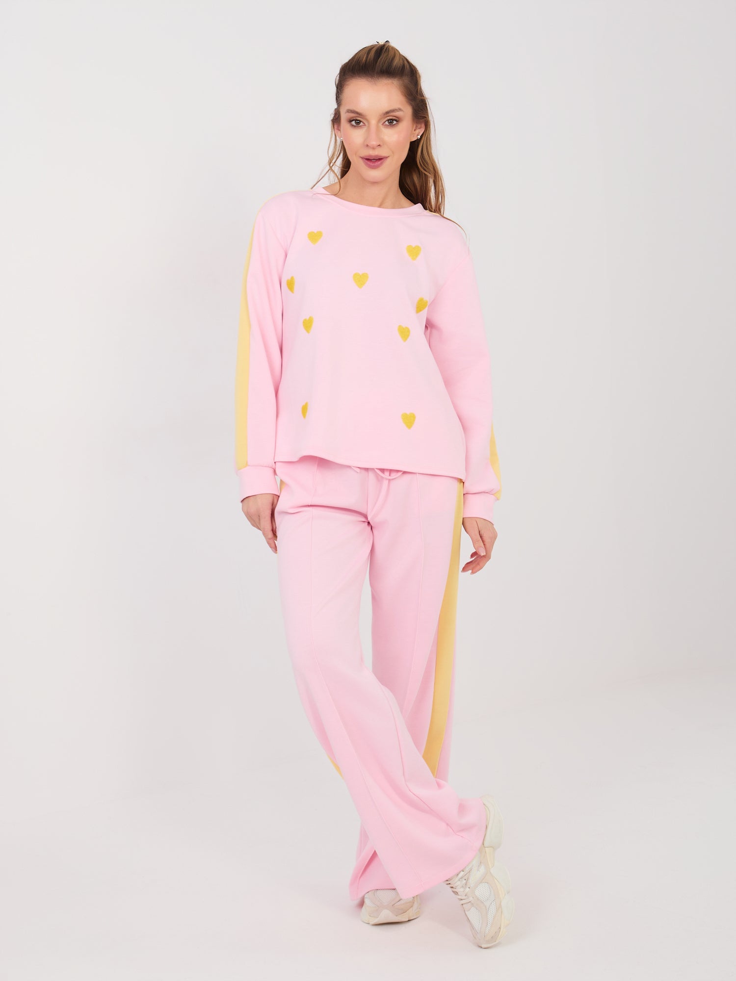 RUE PARIS  Jasnoróżowe dresowe spodnie z przeszyciami