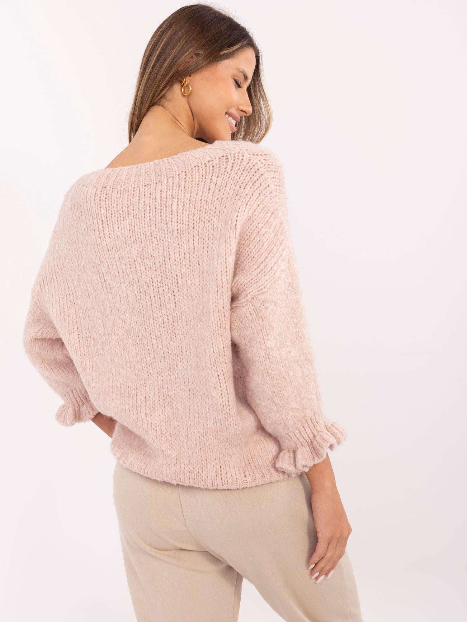 Jasnoróżowy sweter oversize z okrągłym dekoltem