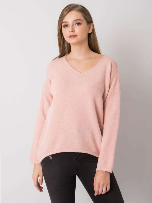 Jasnoróżowy sweter oversize