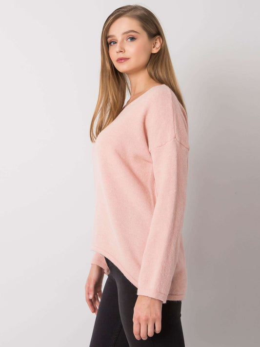 Jasnoróżowy sweter oversize