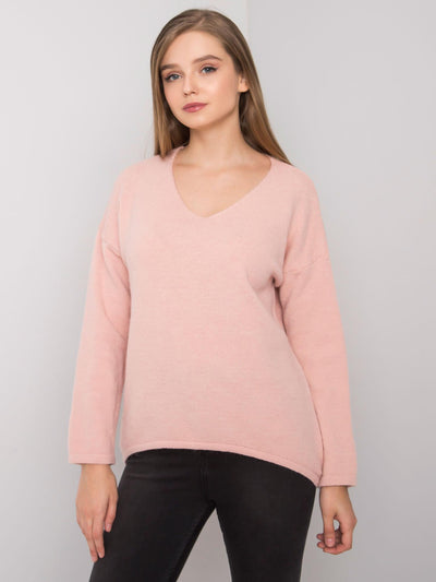 Jasnoróżowy sweter oversize
