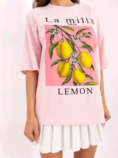 Jasnoróżowy damski t-shirt oversize z napisami