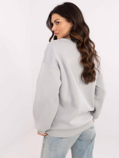 Jasnoszara damska bluza oversize z naszywką