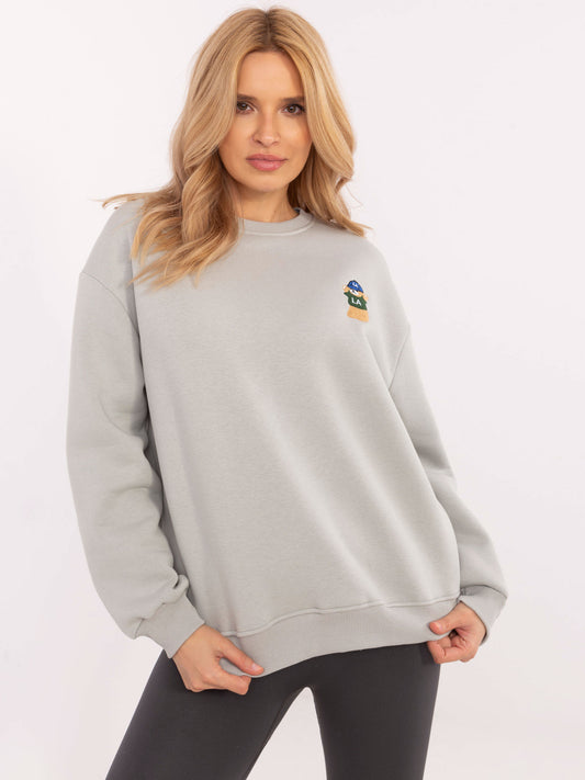 Jasnoszara dresowa bluza oversize z naszywką misia