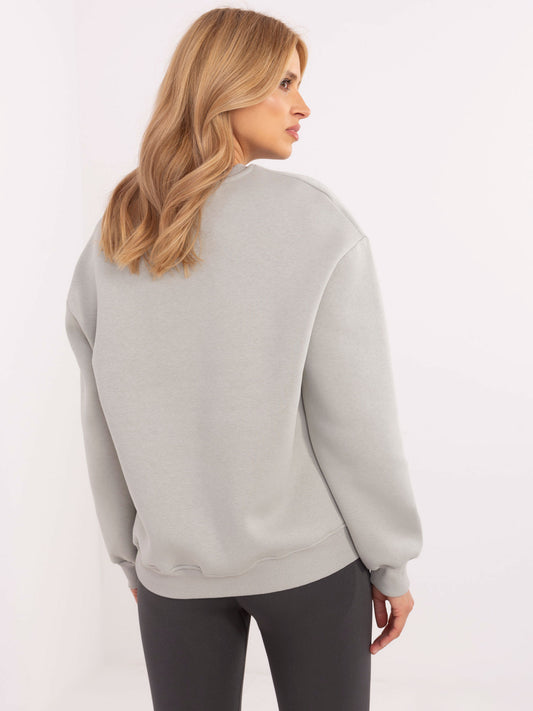 Jasnoszara dresowa bluza oversize z naszywką misia