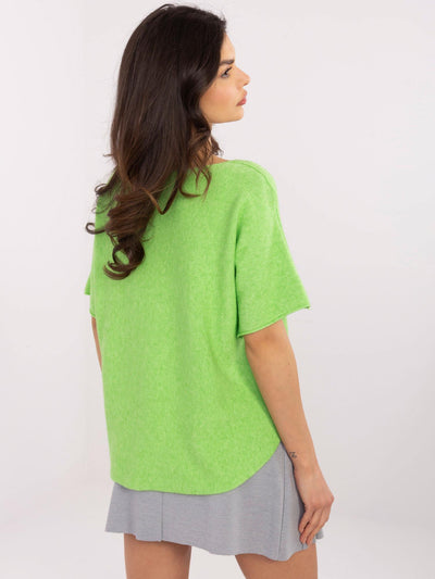 Jasnozielony sweter oversize w jednolitym kolorze