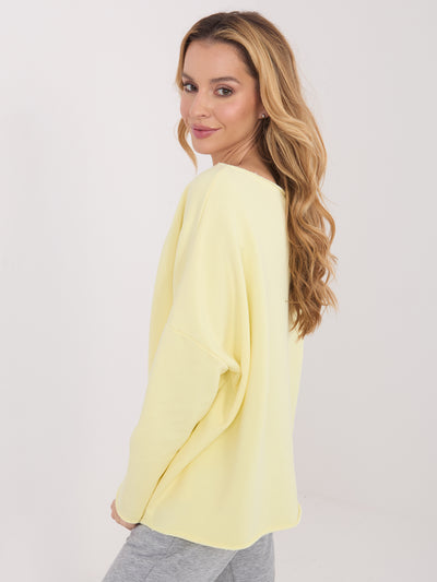 Jasnożółta damska bluza oversize bez kaptura