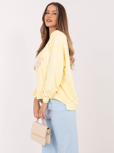 RUE PARIS Jasnożółta damska bluza oversize z napisami