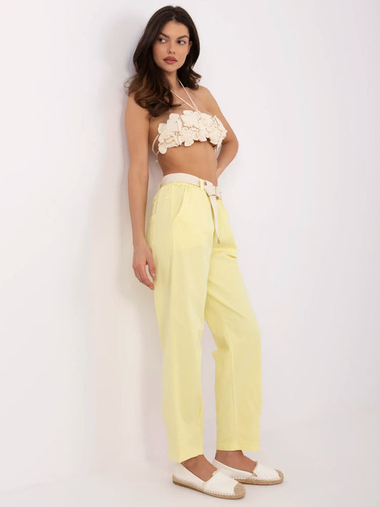 Jasnożółte damskie spodnie typu marchewki