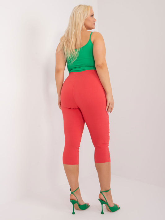 Koralowe spodnie 3/4 plus size z kieszeniami