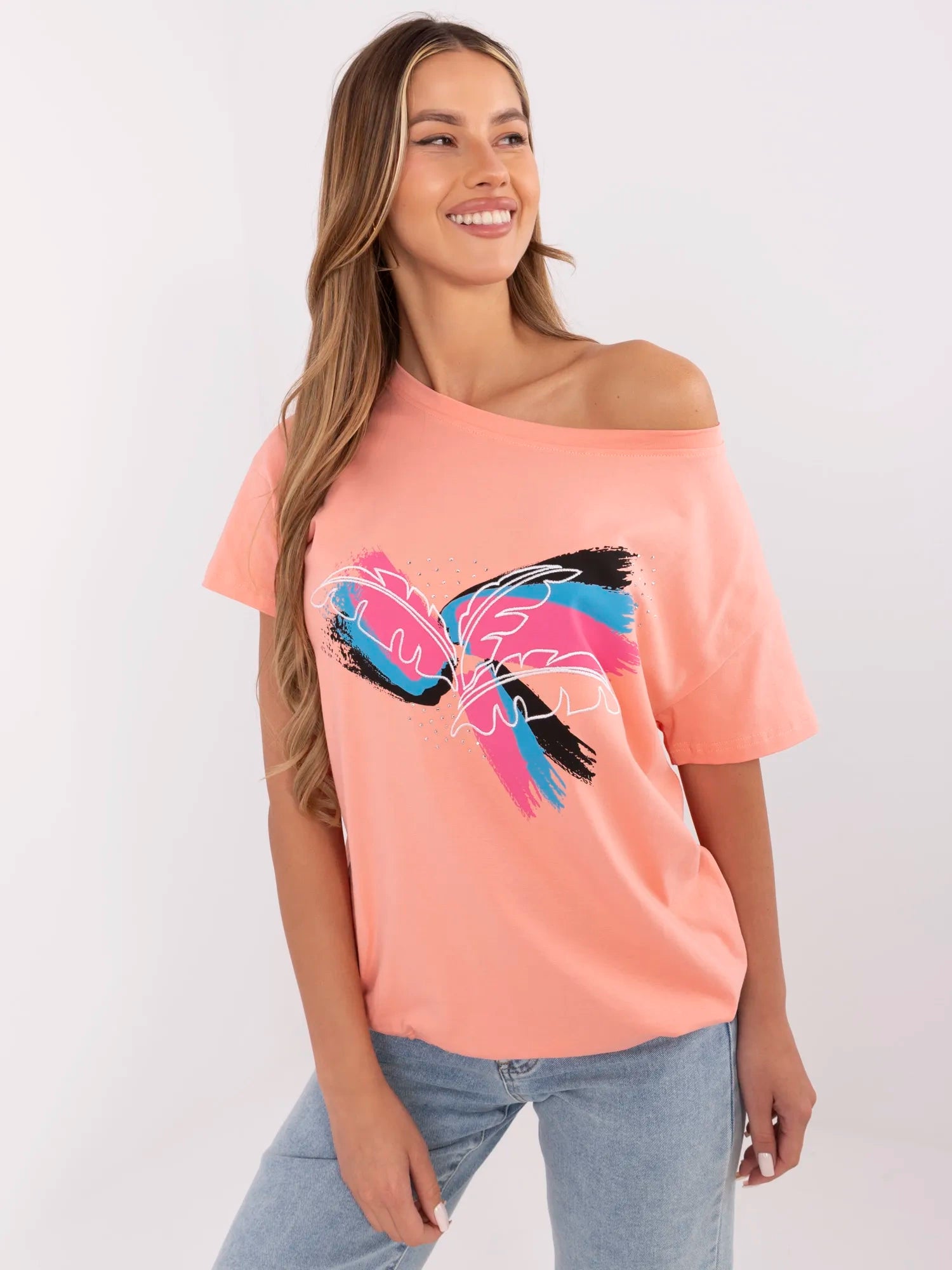 Koralowy t-shirt ze ściągaczem na dole