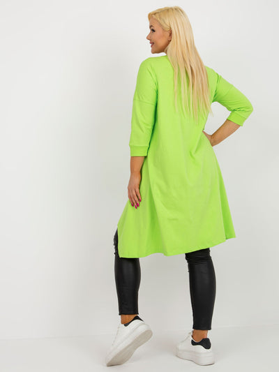 Limonkowa bluzka plus size o asymetrycznym kroju