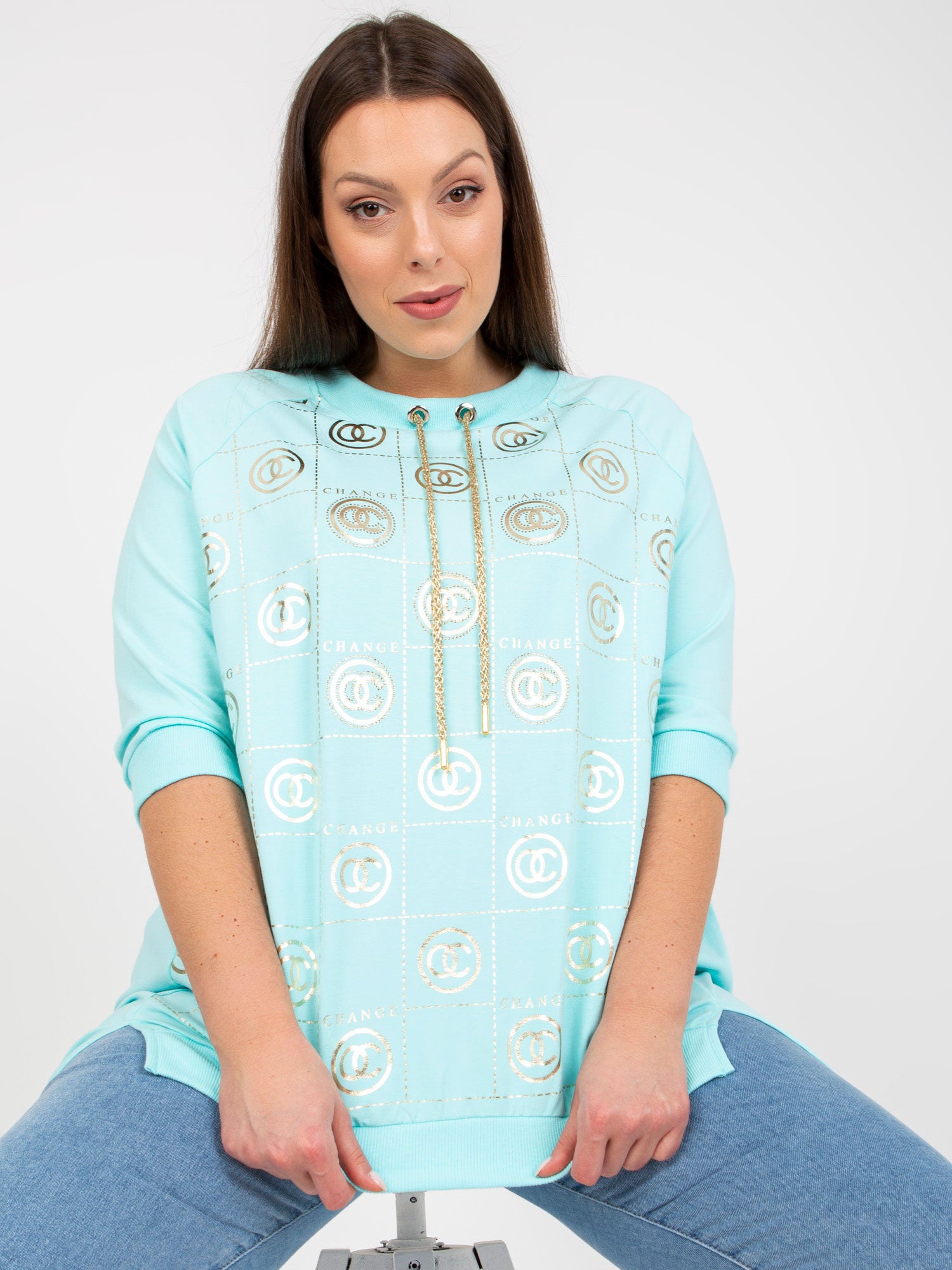 Miętowa bawełniana bluzka plus size z aplikacją