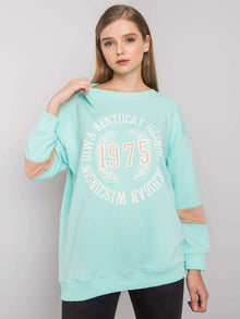 Miętowa bawełniana bluza oversize z nadrukiem
