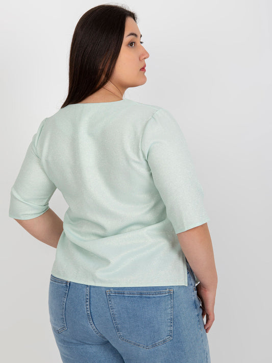 Miętowa elegancka bluzka plus size