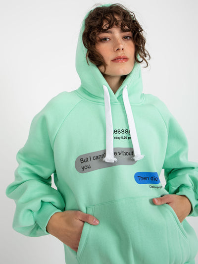 Miętowa dresowa bluza oversize kangurka z napisami
