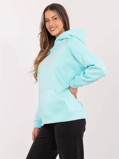 RUE PARIS Miętowa dresowa bluza oversize z napisem