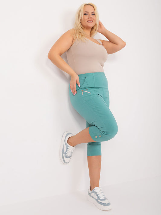 Miętowe spodnie 3/4 plus size z gumką w pasie