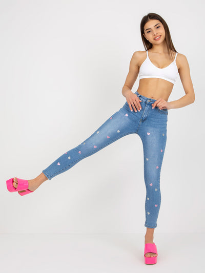 Niebieskie jeansowe rurki z printem