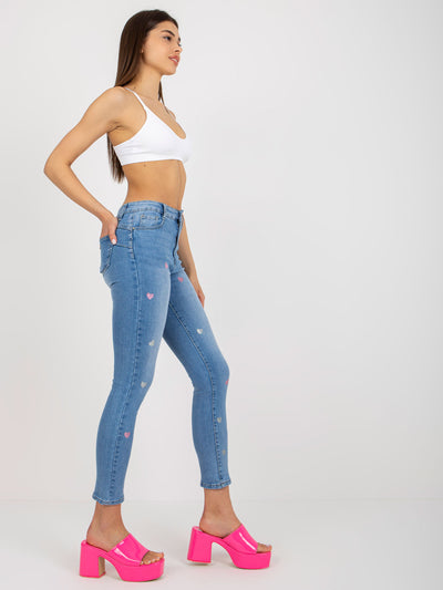 Niebieskie jeansowe rurki z printem