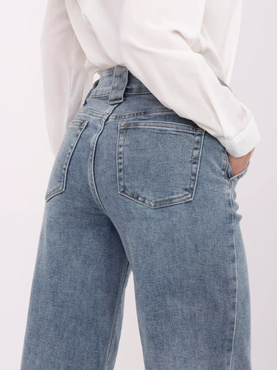 Niebieskie długie jeansy damskie dad fit