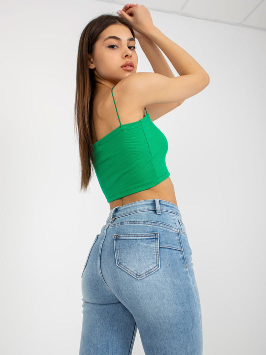 Niebieskie dopasowane jeansy damskie