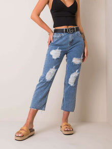 Niebieskie jeansy mom z dziurami